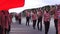 Indonesian scouts unfurl the national flag at the Kirab Kebangsaan (national carnival)