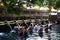 Indonesian and tourism pray and bath themselves in the sacred waters of the fountains, in Tirta Empul, Bali, Indonesia