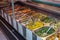 Indonesian Vegetables presented in front store display trays in an Indonesian toko