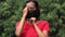 An Indonesian Woman Putting Mask On