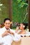 Indonesian women having wellness bath drinking tea