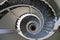 Indoor dark mosaic spiral staircase