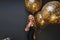 Indoor portrait of stunning fair-haired girl making selfie at festive. Spectacular woman with party balloons having fun