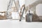 Indoor shot close up frontal view of bricklayer, plasterer or house painter tools on white floor with trowel in home renovation