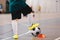 Indoor soccer player training with balls. Indoor soccer sports hall. Football futsal player, ball, futsal floor