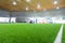 Indoor soccer training field blur abstract background