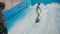 Indoor surf sports club for children. Theme is active recreation and extreme sports on water. Student and coach on