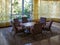 Indoor table and chairs. Old hotel lobby.