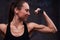 Indoors shot of perfectly trained biceps of woman arm o