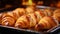 Indulge in the irresistible delight of golden, flaky croissants freshly baked to perfection