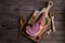 Indulge in the rustic charm of a raw piece of pork loin on a wooden board