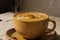 Indulge in the Warmth and Richness of a Steaming Hot Turmeric Latte.AI Generated