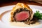 Indulgent Beef Wellington with Buttery, Flaky Pastry and Creamy Mushroom Filling, Served with Garlic Mashed Potatoes