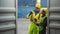 Industrail background of african american containers yard and cargo inspector team working at containers loading area