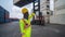 Industrail background of african american containers yard and cargo inspector working at containers loading area