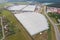 Industrial agricultural greenhouses for growing vegetables. Aerial view.