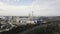 Industrial area and smoking chimney on power plant near the city. landscape. Stock footage. Smoke staks from boiler