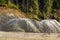 Industrial background with pile of gravel. Extraction of gravel.