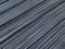 Industrial background. Steel bars reinforcement. Diagonal line