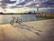 Industrial Black Sea port of Burgas, Black Sea, Bulgaria. Blue and white bicycle of the HEAD company parked near the sea