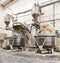 Industrial bread dough mixers in bakehouse.