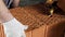 Industrial bricklayer worker placing bricks on cement while building walls. Stock footage. Close up of a man in