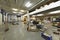 An industrial building with fruit and vegetable crates with polished concrete floors and roofs with skylights