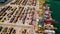 Industrial Cargo area with container ship in dock at port, Aerial view