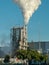 Industrial chimney expelling a lot of smoke