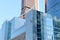 Industrial climber washes glass on the facade of a skyscraper