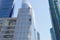 Industrial climber washes glass on the facade of a skyscraper