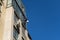 Industrial climbing. Climber wash windows in a high-rise building. Cleaning of windows glass elements