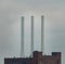 Industrial coal power plant with three large smokestacks