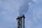 Industrial coal powered electricity plant with pipes and smoke. Ecology problems. Pollution. Chimney smoking