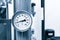 Industrial  concept. equipment of the boiler-house, - valves, tubes, pressure gauges, thermometer. Close up of manometer, pipe, fl