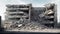 Industrial concrete building destructed by earthquake strike. Disaster scene full. generative ai