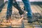 Industrial construction engineer cutting steel using angle mitre saw, grinder and tools