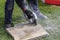 Industrial construction worker using a professional angle grinder