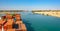 Industrial container ship passing through Suez Canal with ship\'s