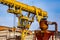 Industrial crane in a factory or port for loading heavy parts