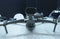 Industrial drone with dual camera aboard placed on stand