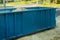 Industrial dumpster filled loaded rubbish removal container renovation building