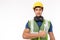 Industrial engineer man hold wrench. Factory man worker wear hardhat, reflective vest. Handsome young industry engineer guy