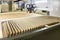 Industrial equipment for packaging finished wooden products for furniture. Automated line