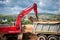 Industrial excavator loader with rised bucket