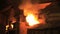 Industrial fire from furnace. Iron and steel industry. Industry fire flame