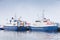 Industrial fishing ships. Blue white trawlers