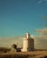 Industrial grain elevator seen from wheat farm in the Palouse Washington state