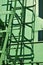 Industrial green metal ladder structure