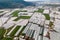 Industrial greenhouses aerial wide shot